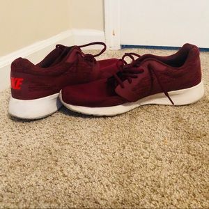 Red Nike running shoes